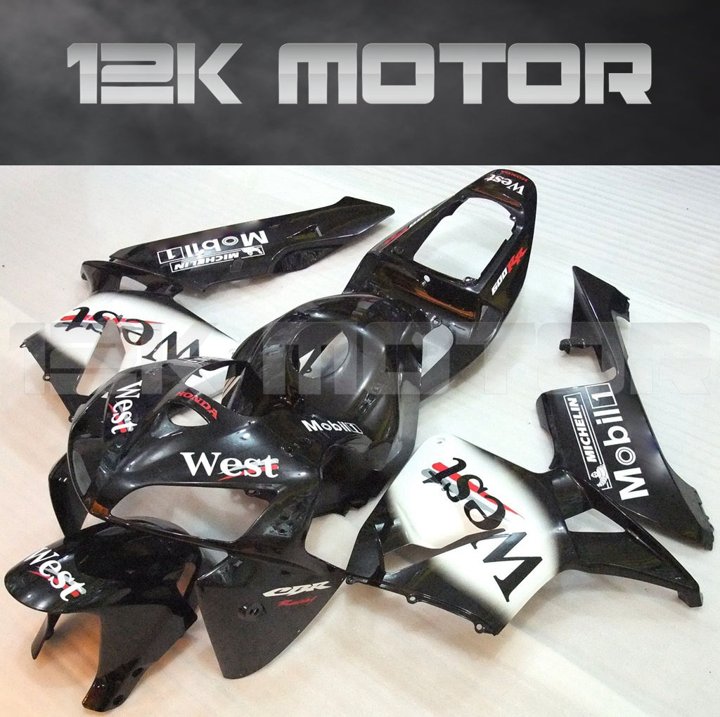 Aftermarket black and white fairing kit for HONDA CBR600RR, displayed without the motorcycle