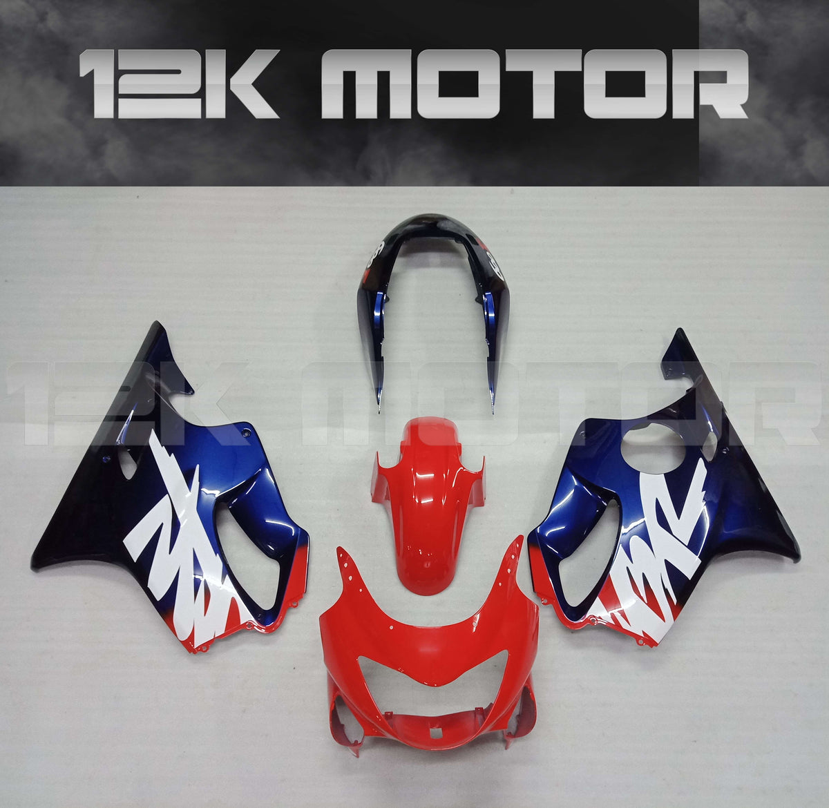 A set of motorcycle fairing kits with red and blue panels, including a front mudguard, front upper fairing, and various other fairing parts laid out on a white background.