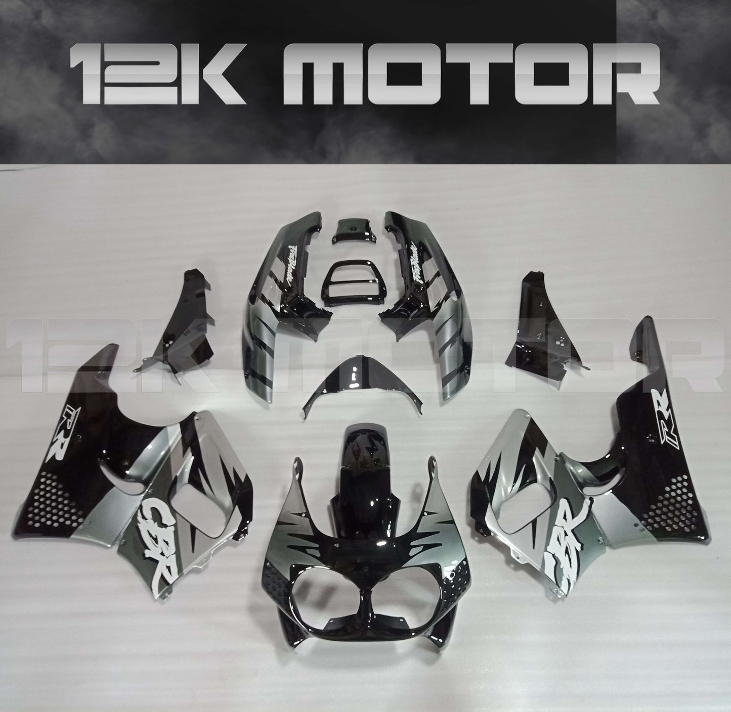Aftermarket fairing kit for HONDA CBR900RR 1992-1995, displayed without the motorcycle, consisting of multiple black and white fairing pieces with visible branding and design details.