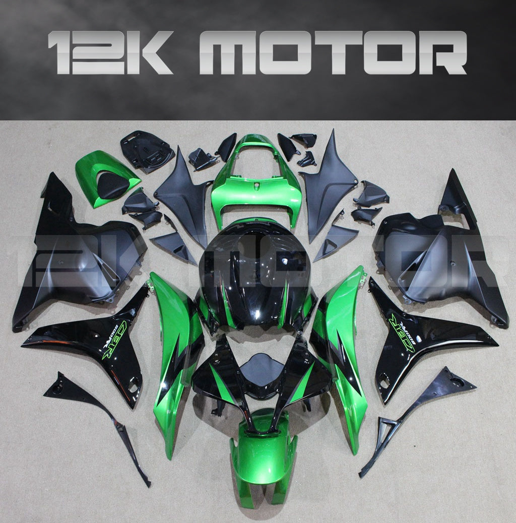 Aftermarket fairing kit for HONDA CBR600RR 2009-2012 displayed on a table, featuring green and black colors with the 12K Motor logo at the top.