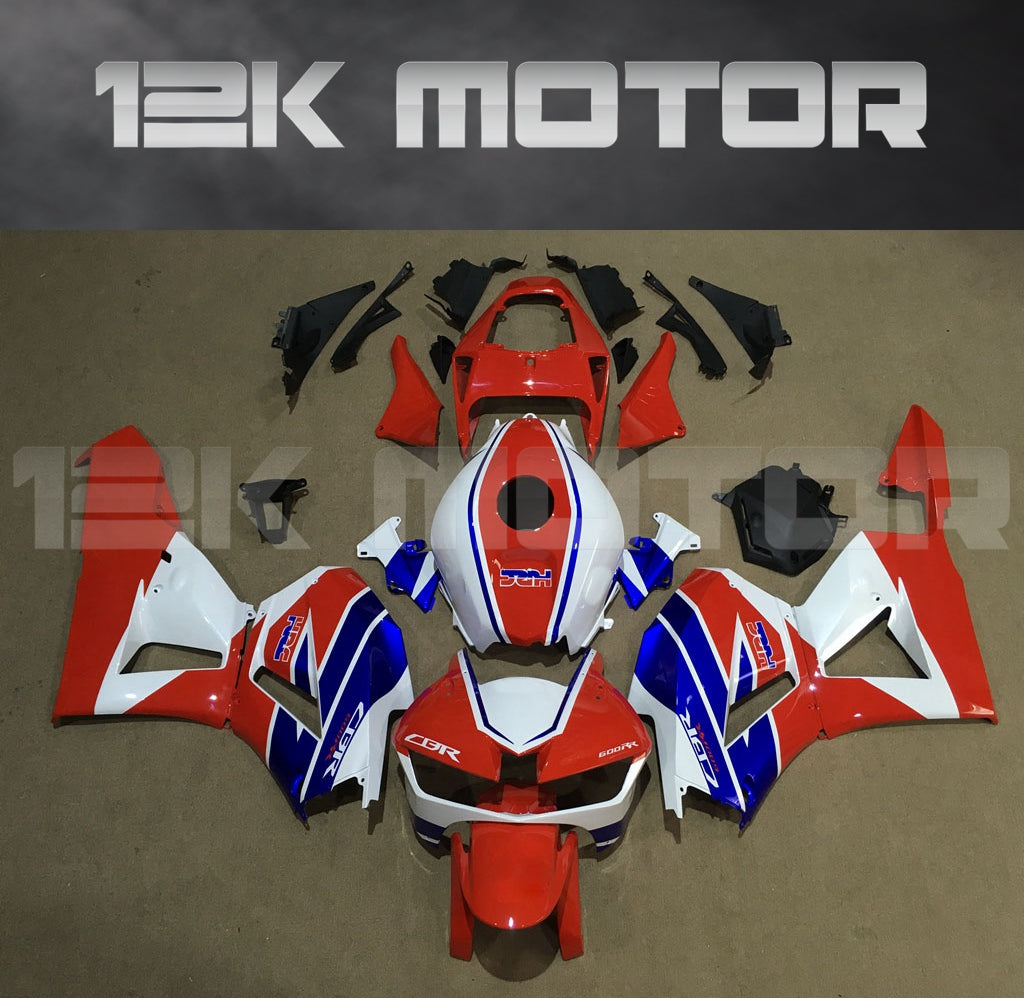 A set of red, white and blue aftermarket fairing kits for HONDA CBR600