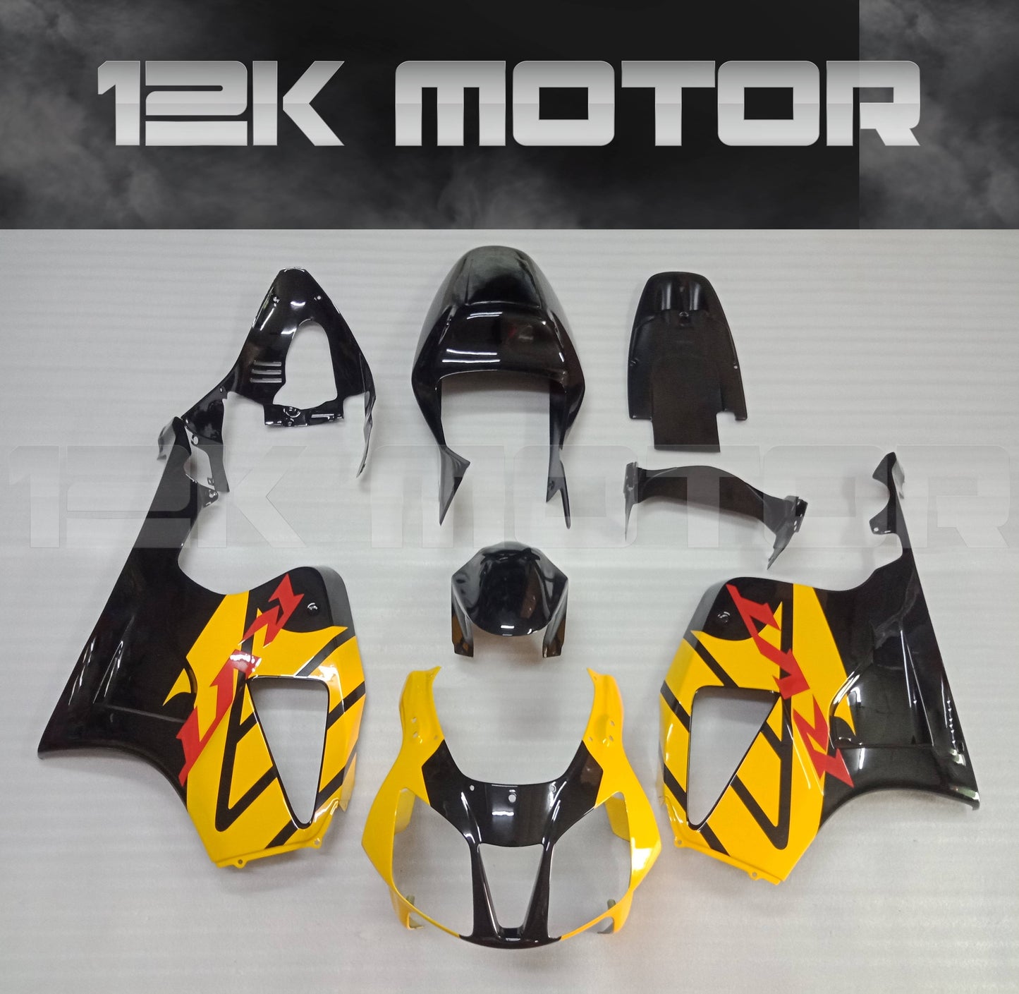 Aftermarket yellow fairing kit for HONDA RVT1000 RC51, including multiple pieces laid out on a table.