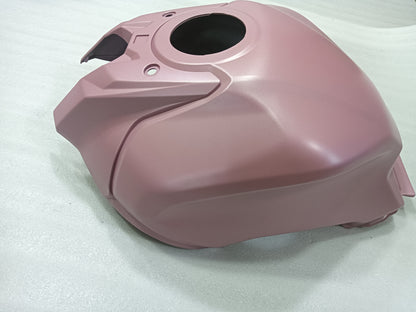 Pink motorcycle fuel tank on a white background