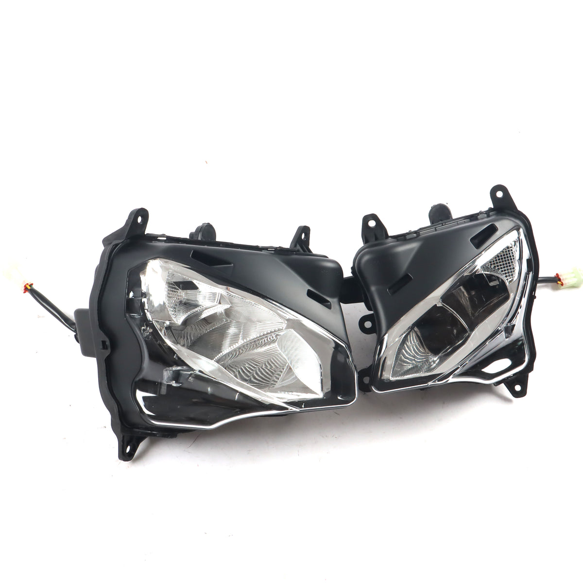 Pair of car headlights on a white background