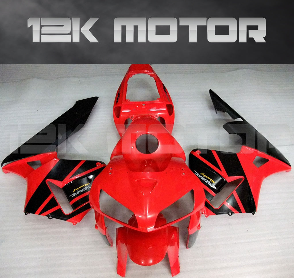 Red and black fairing kit for HONDA CBR600RR, displayed on a motorcycle shape mannequin.