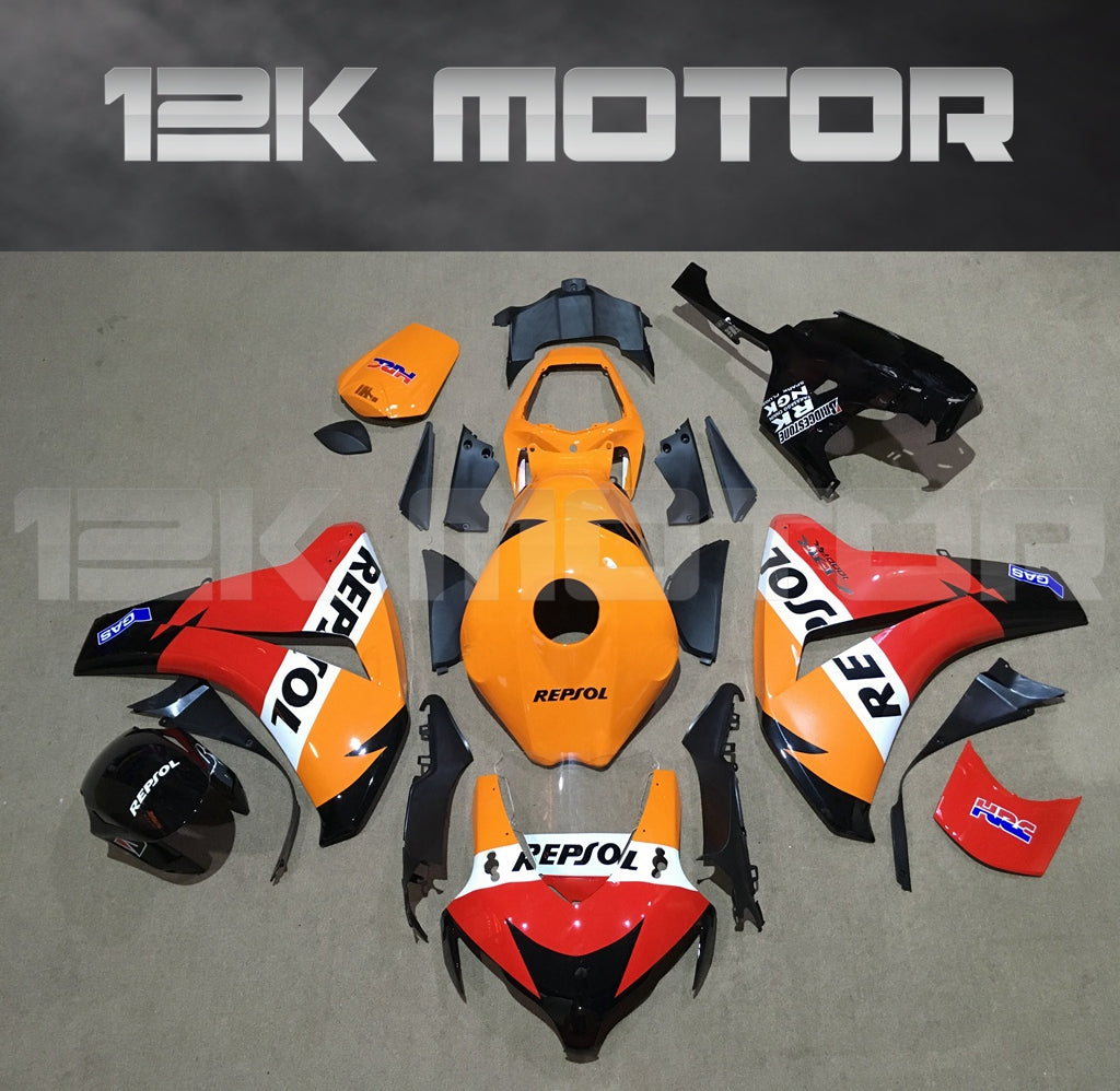 Aftermarket fairing kit for HONDA CBR1000RR motorcycle, featuring a predominantly orange and black color scheme with white and red accents, and the text 'Repsol' displayed.