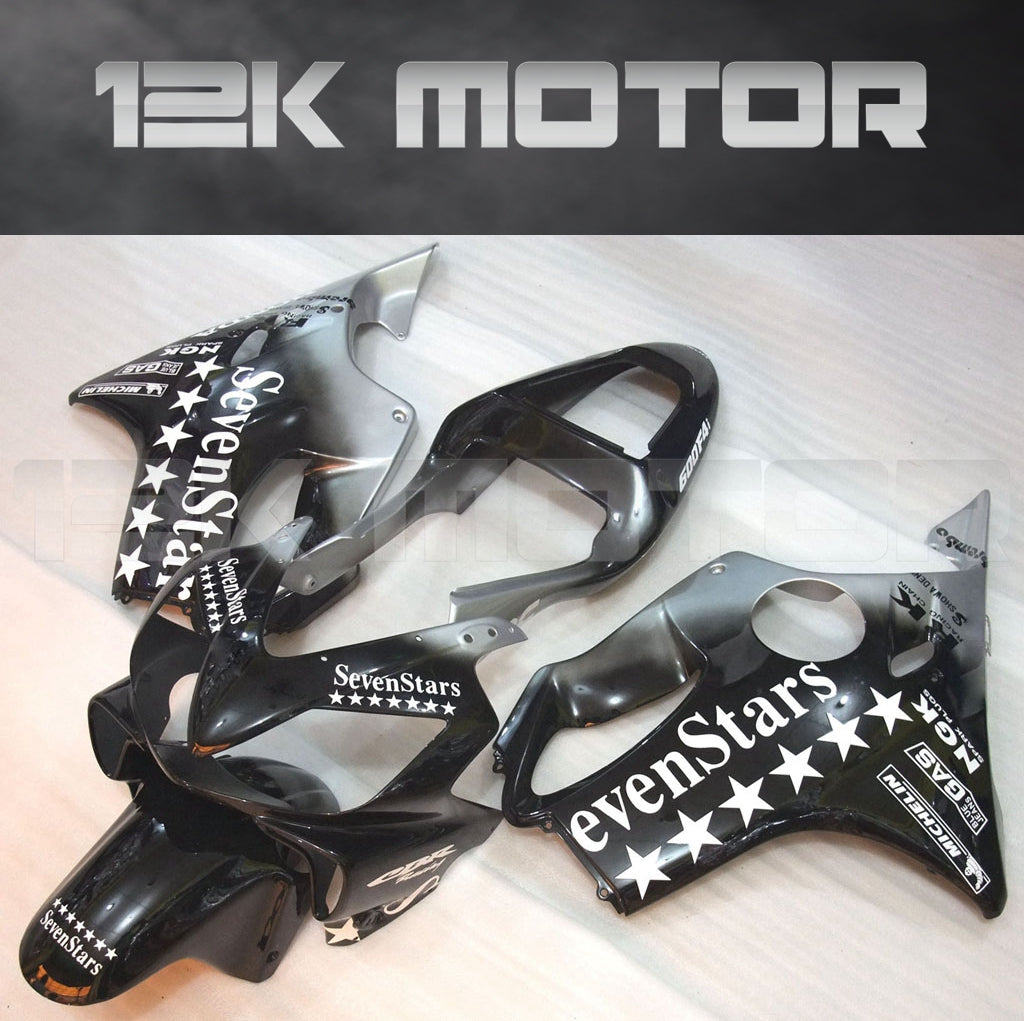 Aftermarket black fairing kit for HONDA CBR600 F4i 2001-2003, including various fairing panels with a star design, a windscreen, and heat shield.