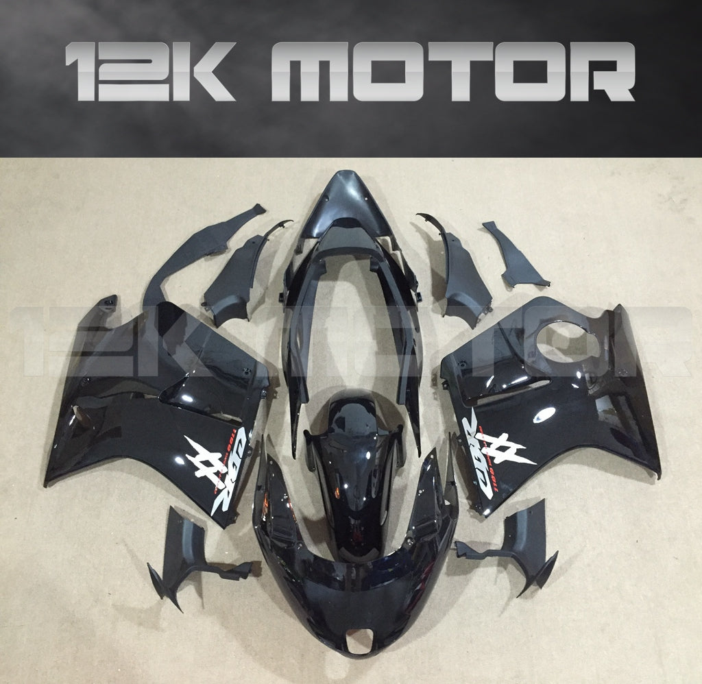Aftermarket black fairing kit for HONDA CBR1100XX Blackbird, laid out on a plain surface.
