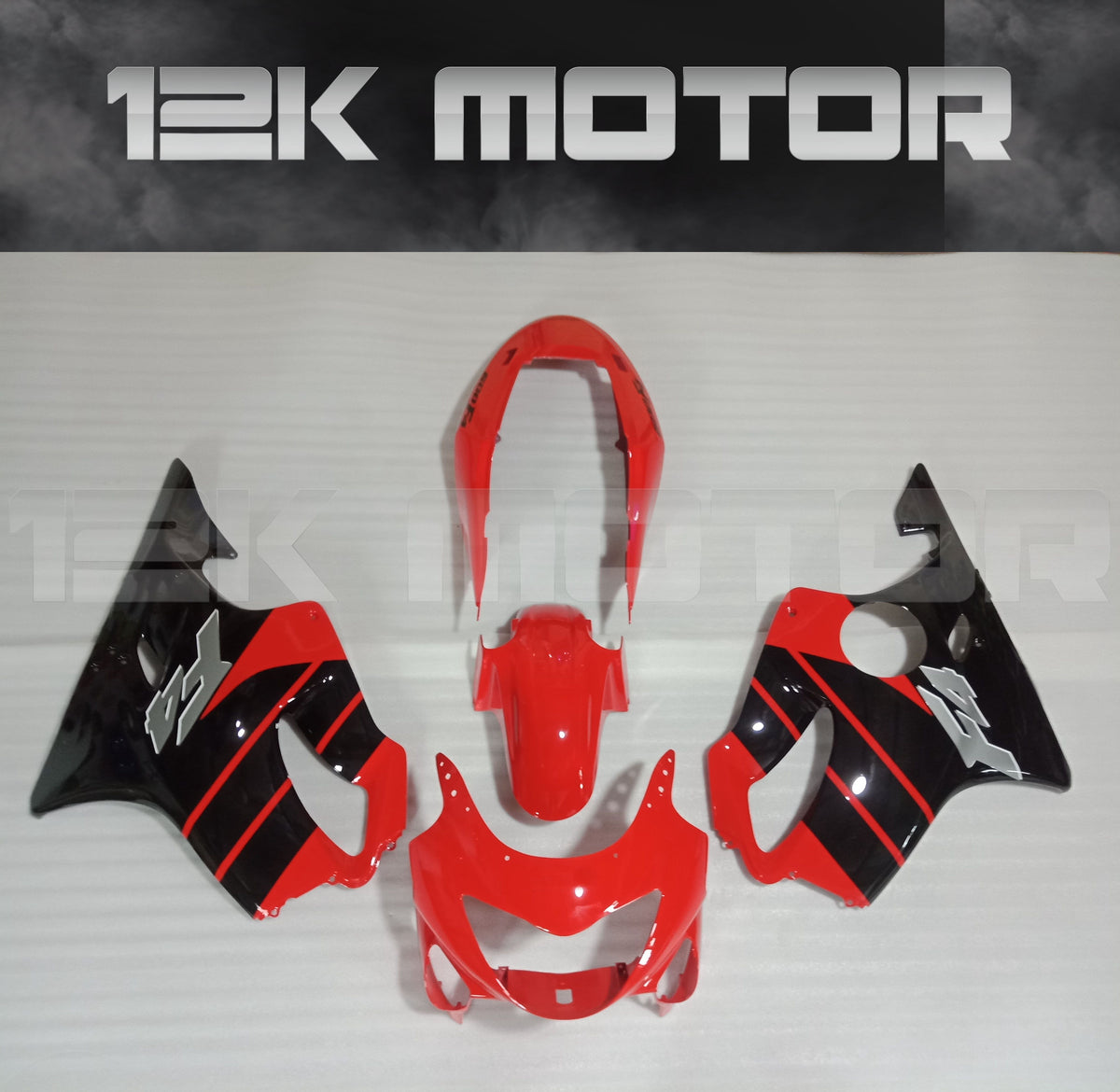A red and black aftermarket fairing kit for HONDA CBR600 motorcycle, including front mudguard, upper fairing, and other panels.