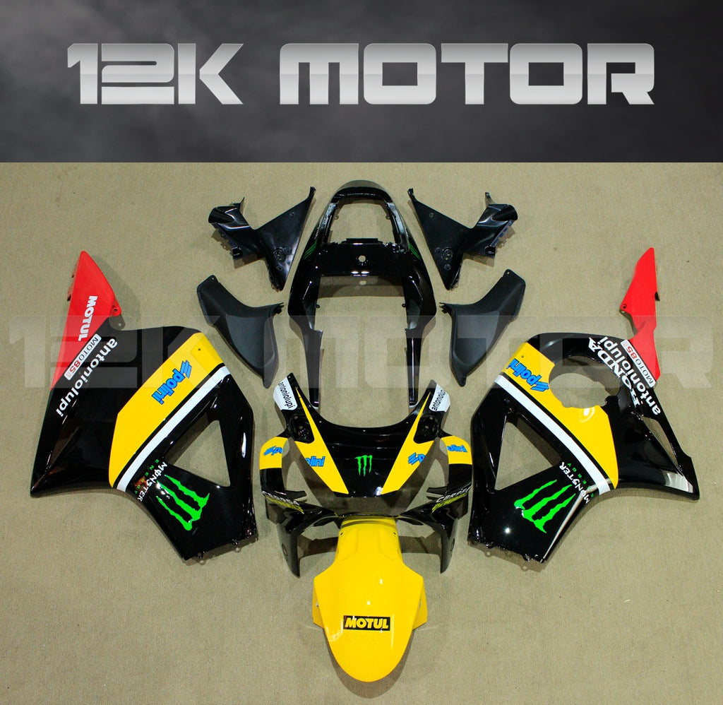 Aftermarket fairing kit for HONDA CBR954RR motorcycle, featuring black, yellow, and red colors with various decals and logos.