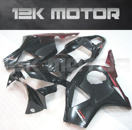 Aftermarket fairing kit for HONDA CBR954RR 2002 2003, displayed as various pieces in black with red accents, including a windscreen and fairing bolts set.