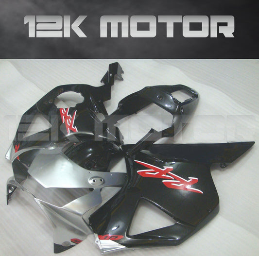 Aftermarket fairing kit for HONDA CBR954RR motorcycle, featuring black and red panels with graphic designs, displayed with '12K MOTOR' branding.