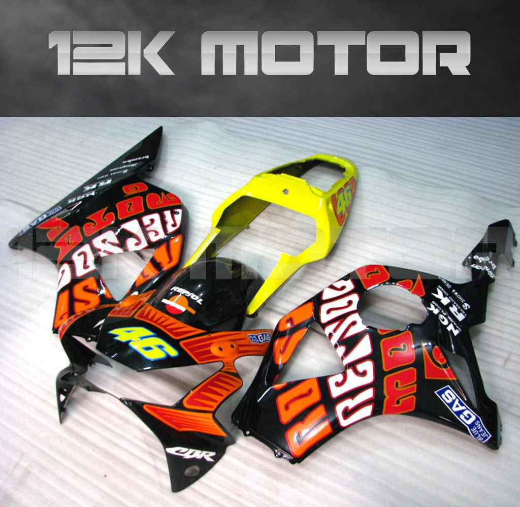 Aftermarket fairing kit for HONDA CBR954RR motorcycle, featuring black, red, and yellow panels with text and graphics.