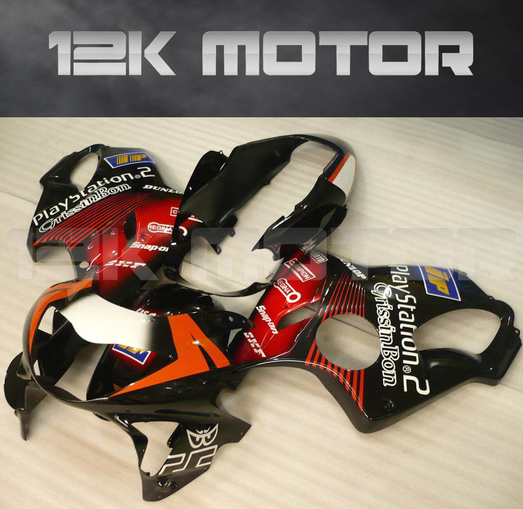 Aftermarket fairing kit for HONDA CBR600RR F4 1999 2000 displayed on a table, featuring a black and red color scheme with sponsor logos.