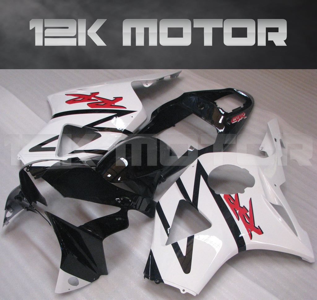 Aftermarket fairing kit for HONDA CBR954RR motorcycle, featuring black and white panels with red accents, including fairing bolts set, windscreen, and heat shield.