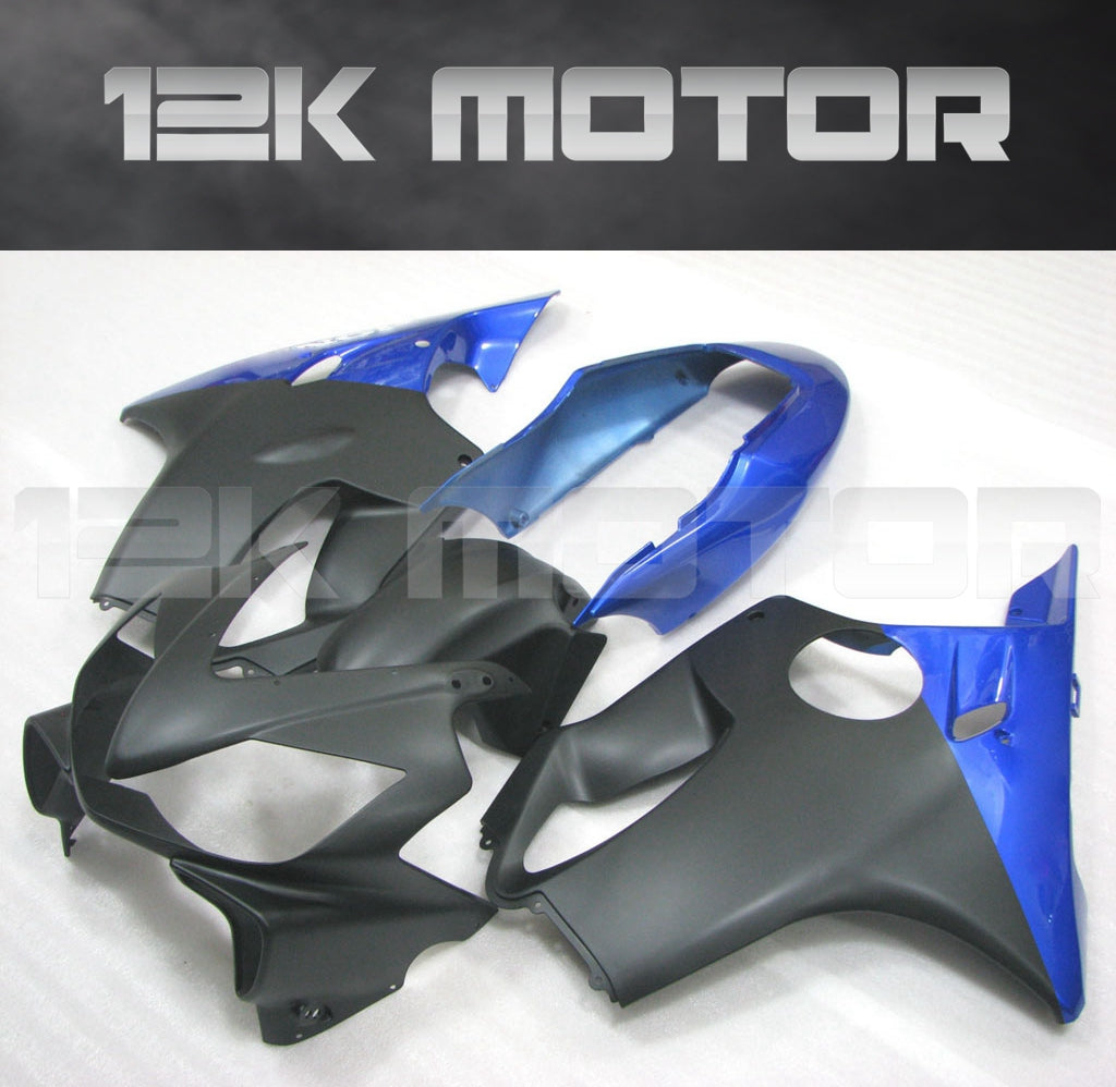 Aftermarket fairing kit for HONDA CBR600 F4i, featuring blue and black panels including pieces for the front upper, sides, and rear duck tail fairing, with the 12K MOTOR logo at the top.