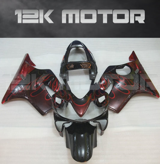 Aftermarket fairing kit for HONDA CBR600 F4i, featuring dark red and black color with a flame design, displayed on a flat surface.