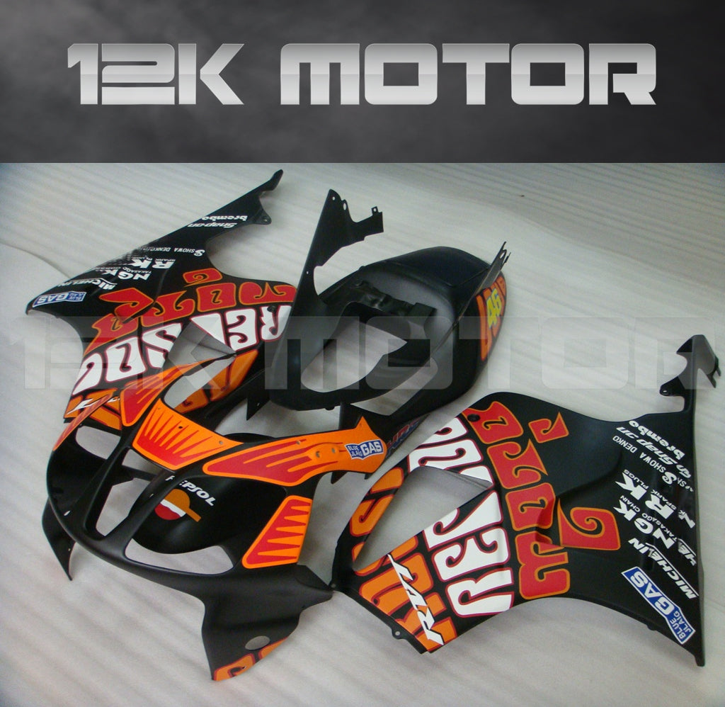 Aftermarket fairing kit for HONDA RVT1000 RC51 SP1 SP2 2000-2006 motorcycle, featuring black, red, and orange colors with text and graphics.