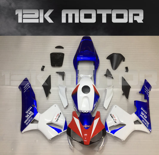 Aftermarket fairing kit for HONDA CBR600RR motorcycle, displayed are multiple pieces in blue, white, and red color scheme.