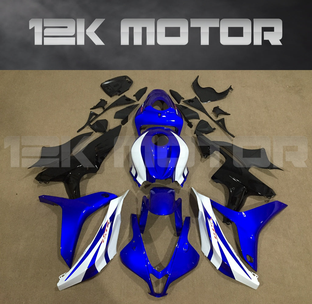 Blue and white fairing kit for HONDA CBR600RR, laid out on a flat surface.