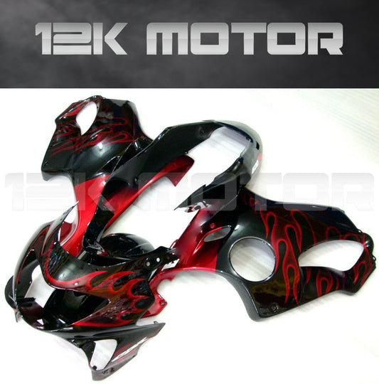 A set of aftermarket motorcycle fairings in black and red, with the brand name '12K MOTOR' displayed prominently.