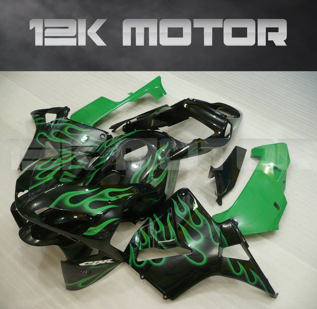 A set of green aftermarket fairing panels for HONDA CBR600RR motorcycle, including front mudguard, upper fairing, and side panels with a logo on the upper.
