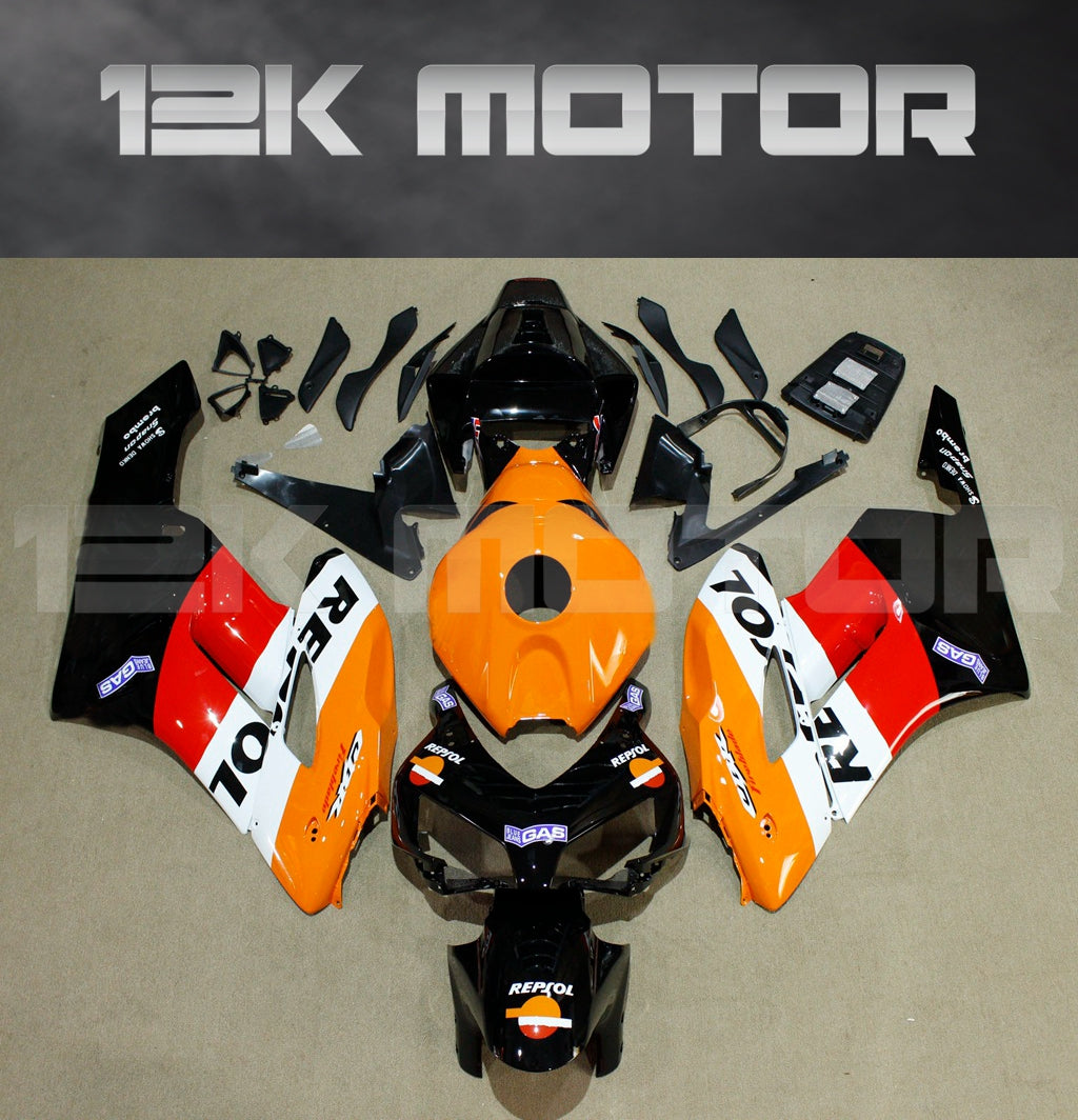 Aftermarket fairing kit for HONDA CBR1000RR motorcycle, featuring orange, black, and white colors with Repsol design branding.