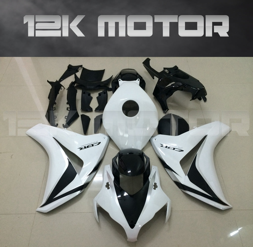Aftermarket white fairing kit for HONDA CBR1000RR motorcycle, displayed on a table with '12K MOTOR' branding in the background.