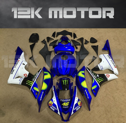 Aftermarket fairing kit for HONDA CBR600RR motorcycle, featuring a blue and white color scheme with Monster Energy branding, displayed on a table.