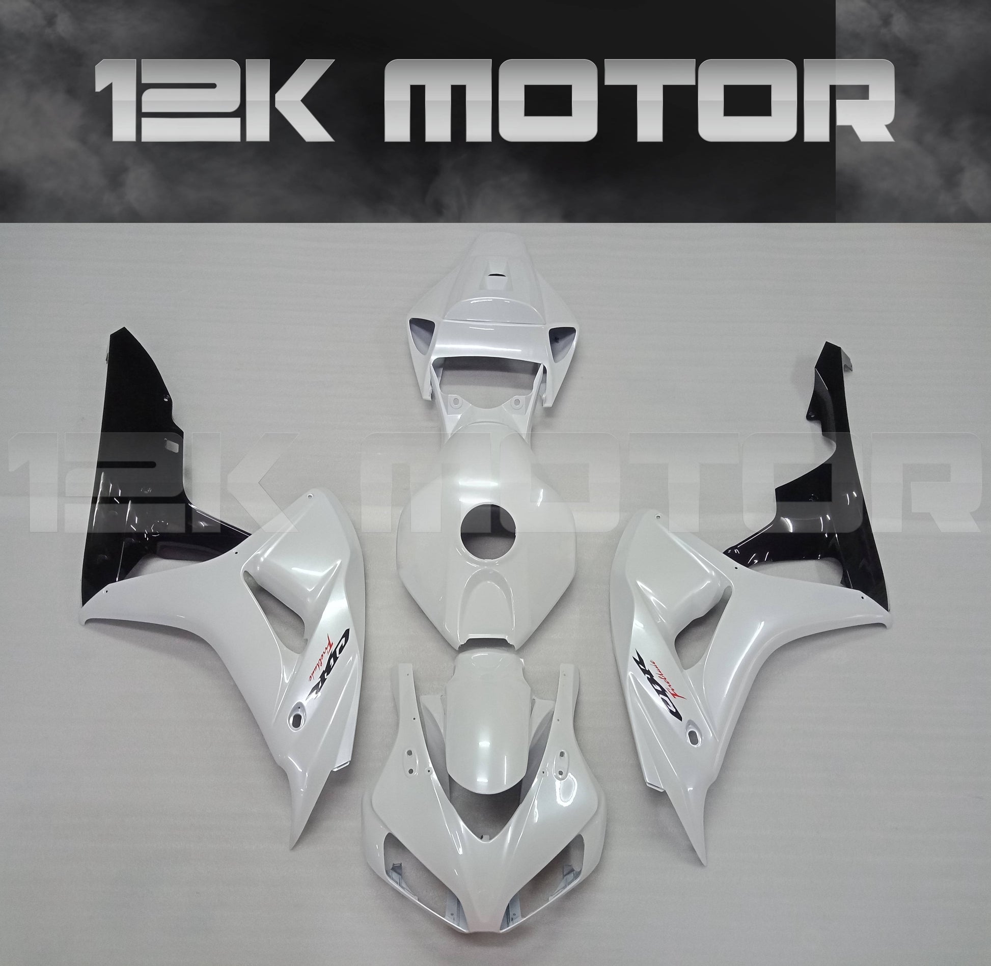 Pearl white fairing kit for HONDA CBR1000RR 2006 2007 displayed on a table with 12K Motor logo in the background.