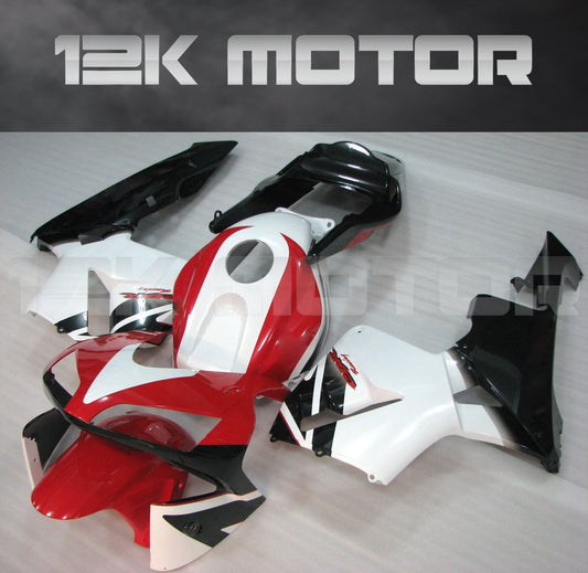 Aftermarket red, white, and black fairing kit for HONDA CBR600RR motorcycle laid out on a flat surface.