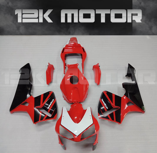 A set of red aftermarket fairing panels for HONDA CBR600RR motorcycle, including a front mudguard, upper fairing, and various side panels.