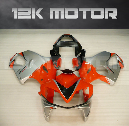 Aftermarket red fairing kit for HONDA CBR600 F4i 2001-2003, displayed without being installed on a motorcycle.