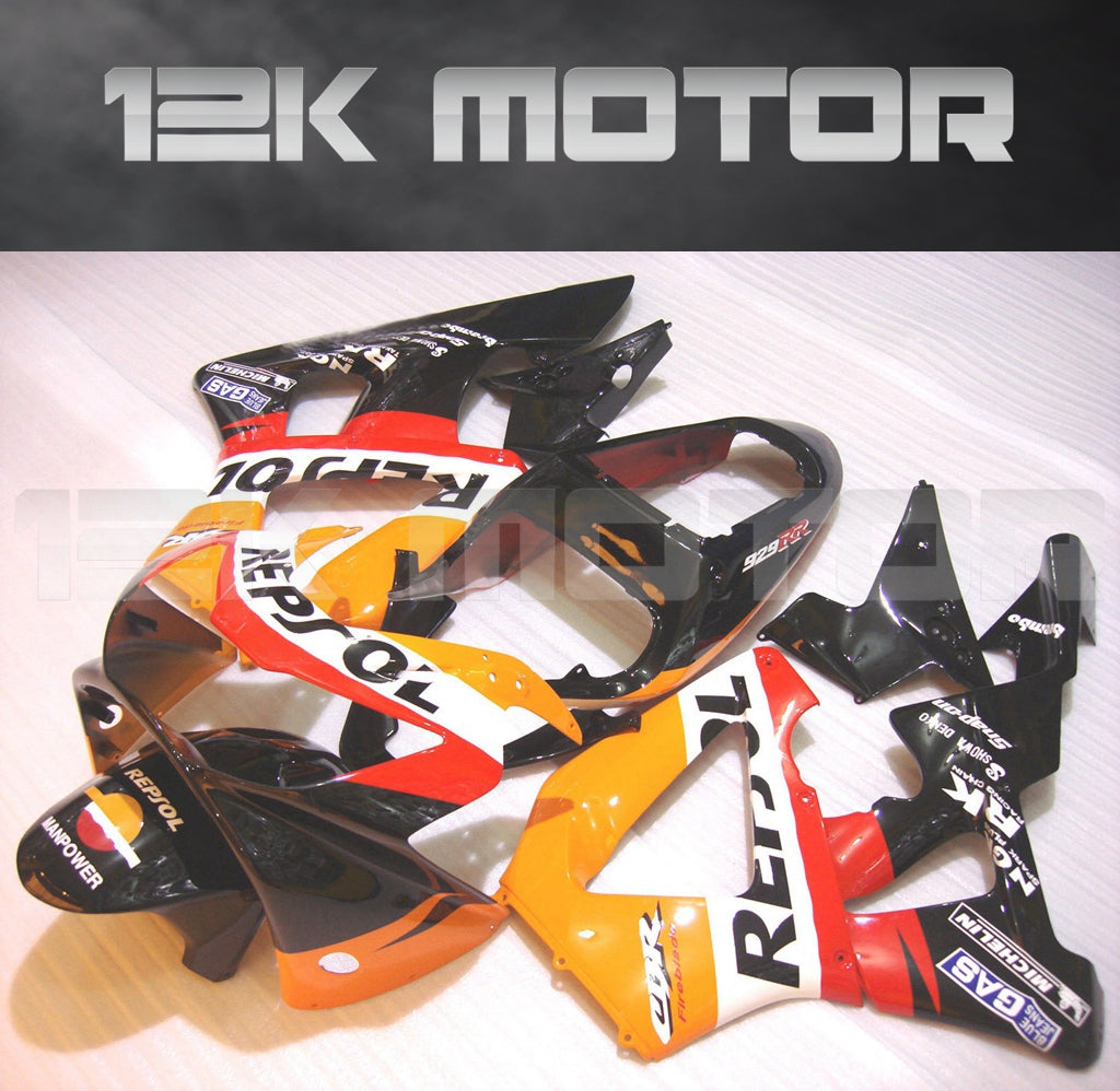 An aftermarket fairing kit for HONDA CBR929RR motorcycle, featuring a combination of black, red, and white panels with graphic designs.
