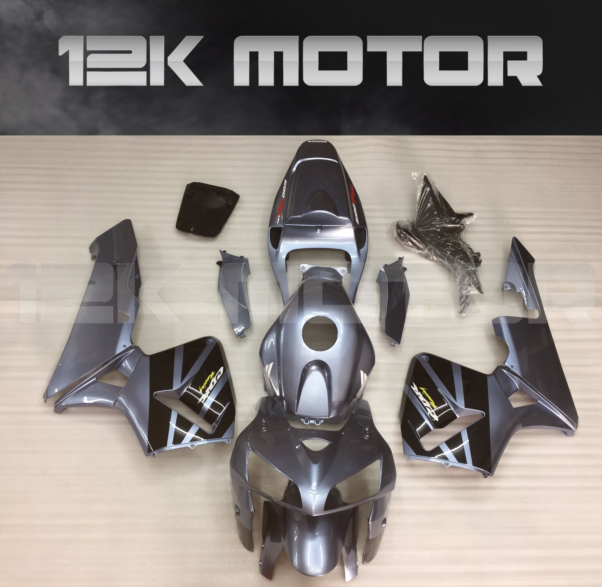 A set of silver aftermarket fairing panels for HONDA CBR600RR motorcycle