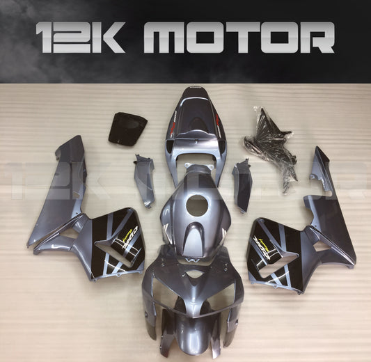A set of silver aftermarket fairing panels for HONDA CBR600RR motorcycle
