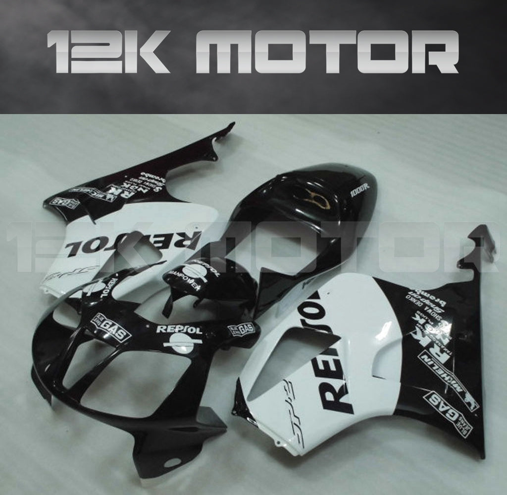 Aftermarket fairing kit for HONDA RVT1000 RC51 SP1 SP 2000 - 2006 motorcycle, featuring black and white panels with text and graphics.