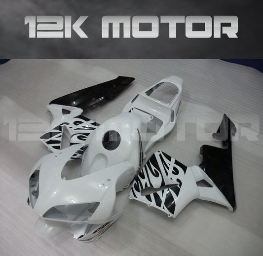 Aftermarket fairing kit for HONDA CBR600RR motorcycle, displayed are white and black fairing panels with a visible logo and design.
