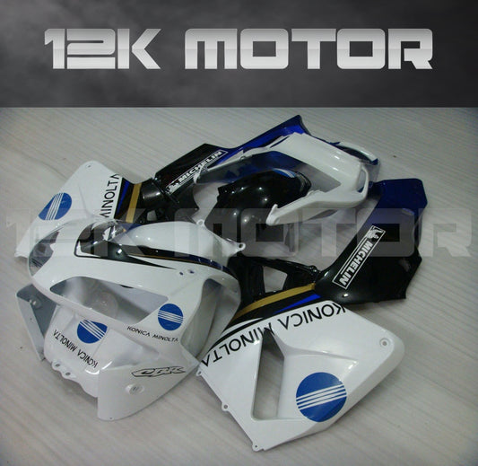 Aftermarket fairing kit for HONDA CBR600RR, consisting of various motorcycle fairing pieces in white, black, and blue colors.