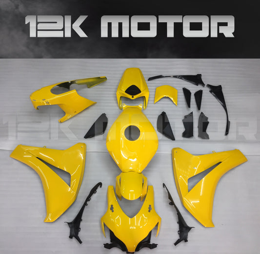 Aftermarket yellow fairing kit for HONDA CBR1000RR 2008-2011 displayed on a table.