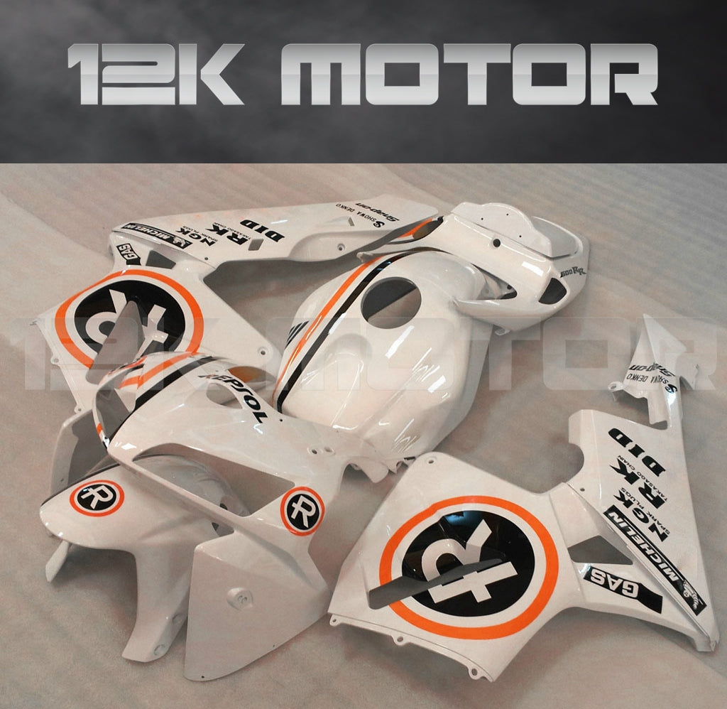 Aftermarket fairing kit for HONDA CBR600RR motorcycle, displayed are white and orange panels with decals, including full fairing panels, windscreen, and heat shield.